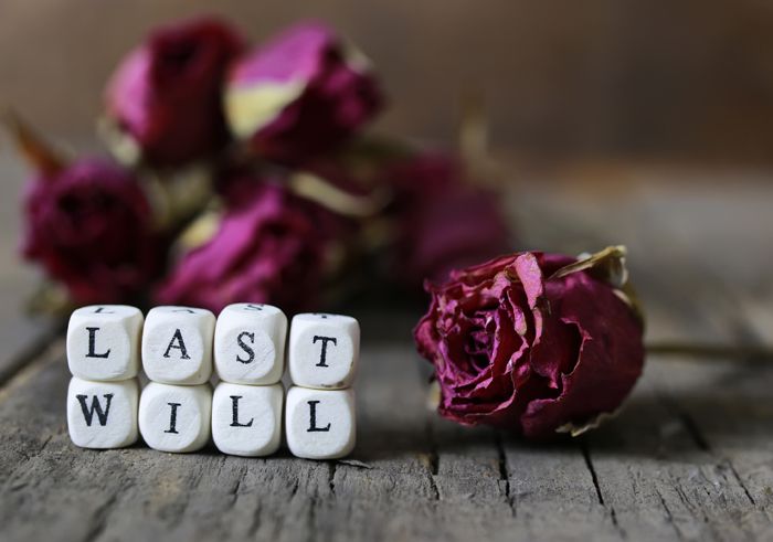 small wooden blocks with letters on them are laid in the floor on the old wooden table